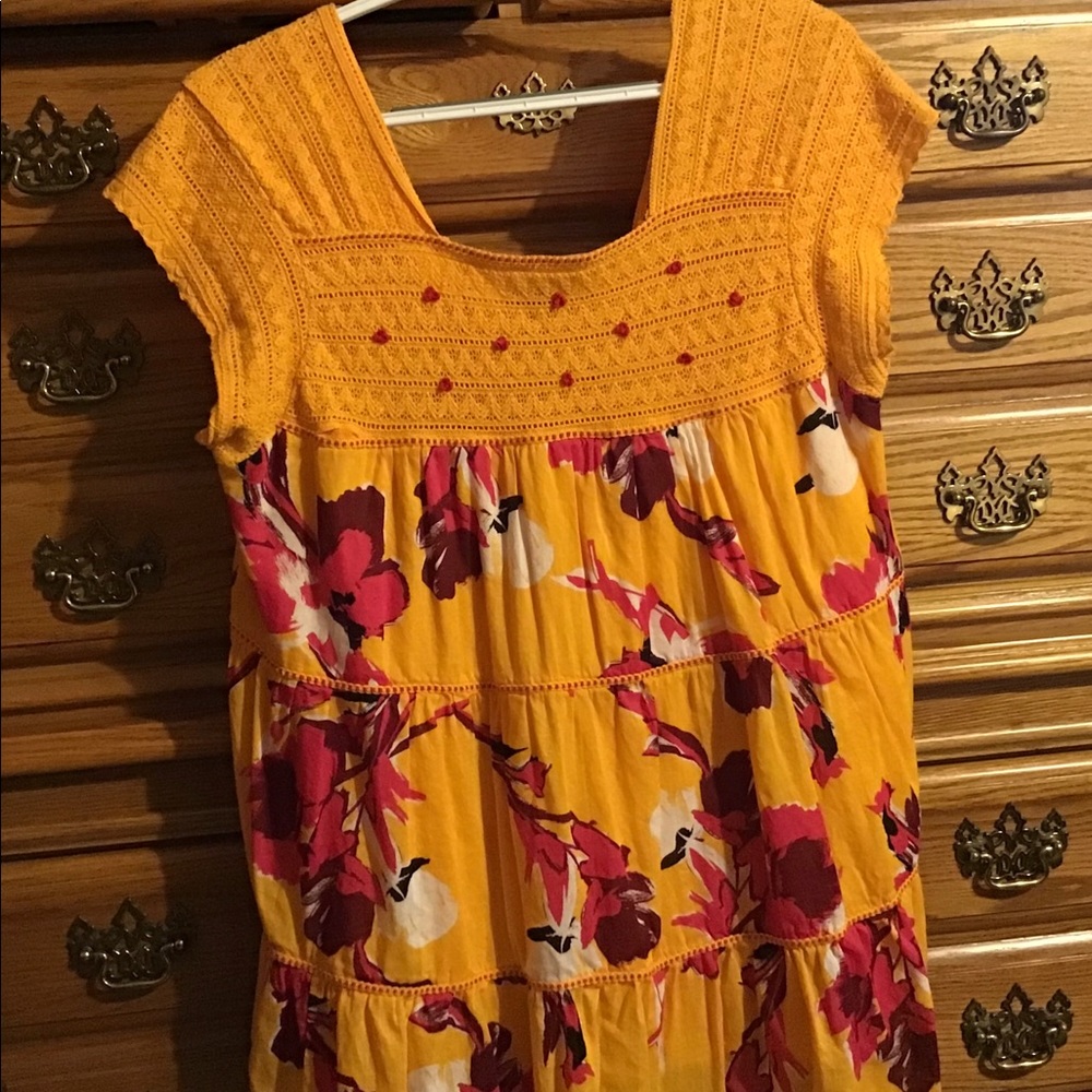 Lane Bryant orange top with pink mauve flowers.